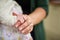 Shes got a firm grasp on Moms heart. Closeup shot of a mother holding her babys tiny hand.
