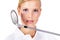 Shes got a great game. Closeup portrait of a young golfer holding her club near her face isolated on white.