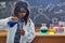 Shes got an inquisitive mind. a little girl in a lab coat doing a science experiment in a lab.