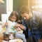 Shes got a natural talent for baking. a father and daughter making pancakes together.