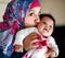 Shes my little love. a muslim mother and her little baby girl.