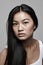 Shes simply gorgeous. Studio shot of a beautiful young woman posing against a gray background.