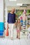 Shes a smart little shopper. a mother and daughter out shoe shopping in the mall.