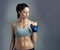 Shes an unstoppable force. Studio shot of a sporty young woman against a gray background.