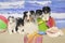 A Shetland Sheepdog Family on a Beach