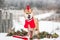 Shiba dressed up as Santa Claus.A dog in a Santa outfit.