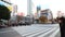 Shibuya pedestrian crossing and car traffic by day, Tokyo, Japan