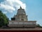 Shikhara peak of a Hindu temple against the blue sky in Durbar Square in Kathmandu.