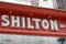 Shilton sign logo and text brand on entrance facade clothing trendy store fashion