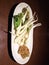 Shima rakyo, raw island scallions served with miso paste, local specialty dish on Zamami island in Okinawa, Japan