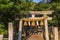 Shimenawa and shide, on torii gate to shrine, Kanazawa, Japan