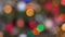 Shimmering abstract colored circles defocused christmas lights background. Blurred fairy lights. Out of focus holiday back