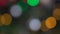 Shimmering abstract colored circles defocused christmas lights background. Blurred fairy lights. Out of focus holiday back