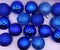 Shimmering Blue Christmas Ornaments on White Background