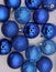 Shimmering Blue Christmas Ornaments on White Background