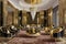 Shimmering chandeliers and velvet furniture creating a luxurious home image, generated by Ai