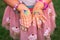 Shimmering sparkling glitter tattoo on a child& x27;s hand at a birthday party