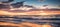 The shimmering waves reflect the warm hues of the setting sun creating a tranquil and breathtaking scene. Generative AI