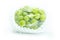 Shine Muscat Grape in packaging and foam cushioning on a white background. Green grapes