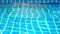 Shining blue water ripple in pool. Video shift