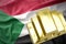 Shining golden bullions on the sudan flag