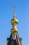 Shining golden cupola of orthodox church under blue sky
