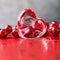 Shining transparent heart and a group of red beads. Perfect Valentine`s Day greeting card background. Image in red tone on grey