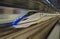 Shinkansen high-speed bullet train with motion blur.