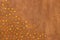 Shiny amber gems on textured leather background