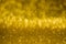 A shiny background, shimmering texture in yellow