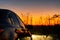 Shiny black car with a beautiful sunset at the Shenandoah Mountains in Virginia, USA