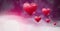 Shiny bubbly Valentines hearts with purple bokeh misty background