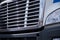 Shiny chrome grille of large semi truck