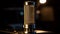 Shiny chrome microphone glows under nightclub spotlight generated by AI