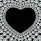 Shiny diamond heart frame on black background