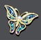 shiny glamorous butterfly brooch on a dark background with reflection
