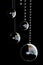 Shiny glass balls on a black background. Beautiful Vertical 3d illustration