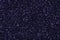 Shiny glitter texture, holiday background in new dark blue tone for design. parkling shiny wrapping paper for New Year