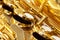 Shiny golden keys of alto saxophone close-up view