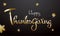 Shiny Golden Typography of Happy Thanksgiving on black background decorated with maple leaves.