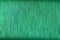 Shiny green background with striped texture