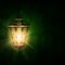 Shiny lantern over dark eid al fitr background