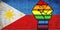 Shiny LGBT Protest Fist on a Philippine Flag