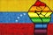 Shiny LGBT Protest Fist on a Venezuela Flag