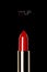 Shiny new red or scarlet lipstick over black