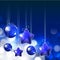 Shiny ornaments and lights on blue background for holy christmas