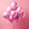 Shiny pink metallic balloons isolated on pink background. Card for wedding, woman\\\'s day, mothers day, valentine\\\'s da