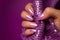 Shiny purple nails manicure