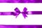 Shiny purple satin ribbon on white background