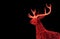 Shiny Red Illuminated Christmas Reindeer Shaped Outdoor Decoration Lights on Dark Background